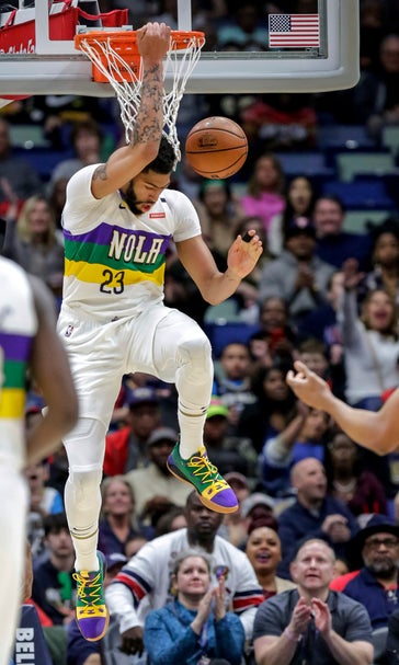 Untraded Davis scores 32, Pelicans beat Wolves, 122-117